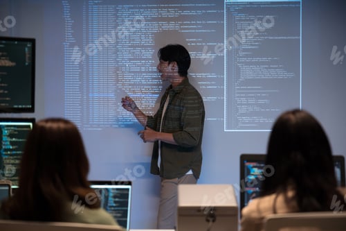 Preview: Asian man educational coding workshop teaching programming and problem-solving