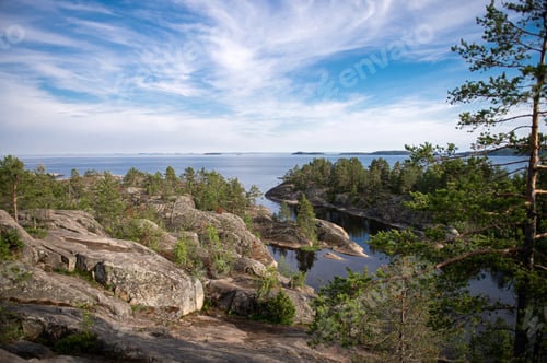 Preview: Spruce forest on top of a cliff. Sheer cliffs on Ladoga skerries. Top view of the lake