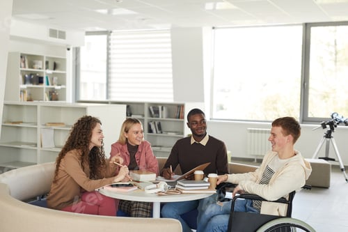 Preview: Group of Students doing Homework in Library