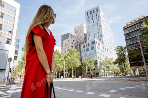 Preview: Business district with woman in Barcelona
