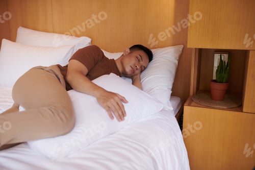 Preview: Man Sleeping with Pillow
