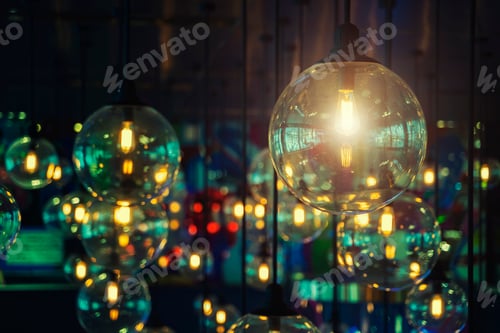 Preview: Many vintage lamps hanging in room. electricity and energy background concept.