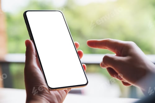 Preview: Mockup image of a woman holding and pointing finger at mobile phone with blank white desktop screen