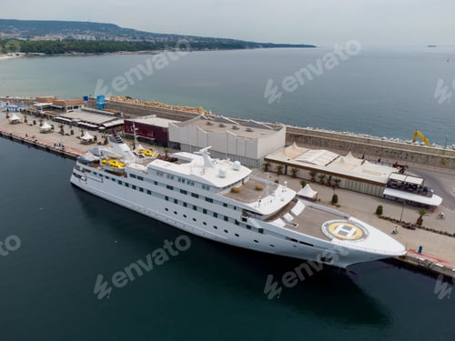Preview: aerial view of luxury yacht in port