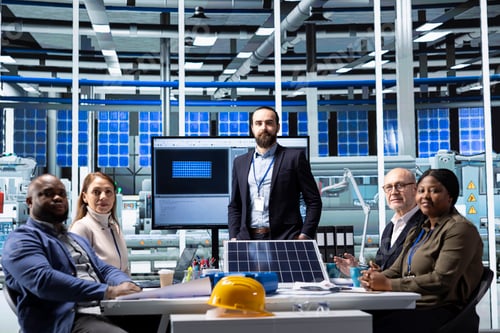 Preview: Portrait of factory executives doing meeting to discuss automation strategies