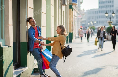 Preview: Guy tired of shopping leaning against a wall.