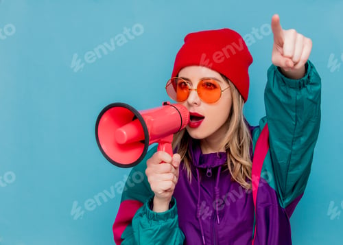 Preview: woman in red hat, sunglasses and suit of 90s with loudspeaker