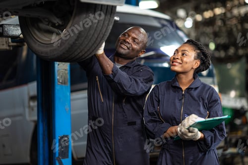 Preview: garage mechanic team working car auto service black african people professional worker together