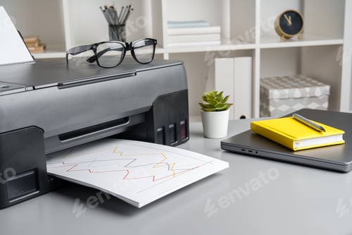 Preview: Close up of modern printer in the office