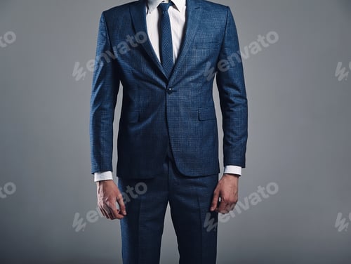 Preview: Portrait of young handsome man posing in studio