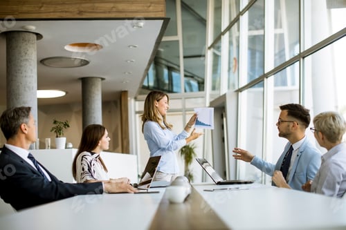 Preview: Group of business people with young adults and senior woman colleague