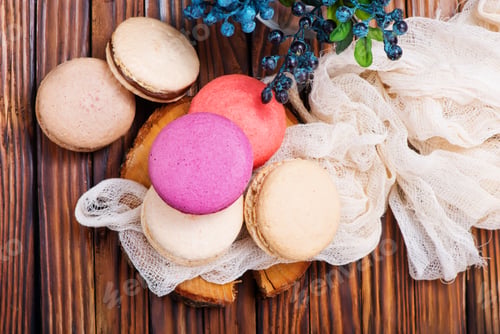 Colorful Macarons on Wooden Table with White Cloth