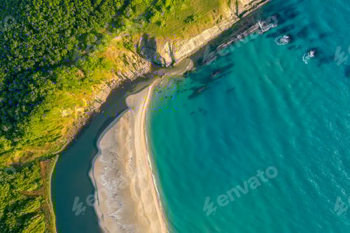 Preview: Picturesque rocky coastline with sandy beaches and green forests