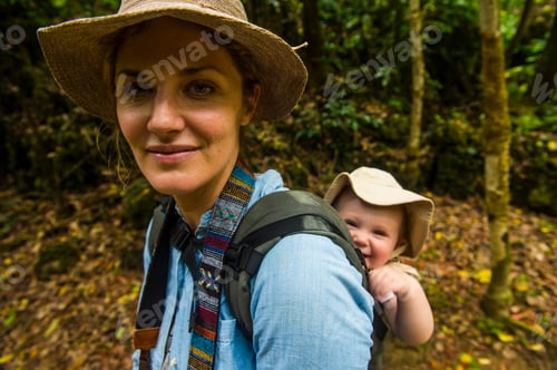 Preview: Japan, Okinawa, Woman hiking with her baby through the Unesco world heritage sight, sacred site Sefa