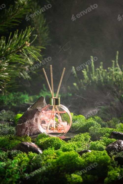 Preview: Aromatic fragrance diffuser on the moss among the damp stones.