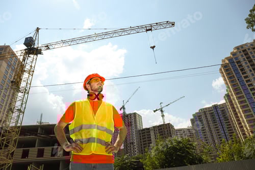 Preview: Young man civil engineer in safety hat
