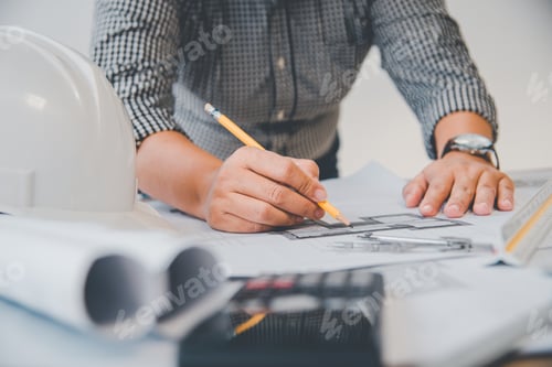 Preview: engineer working in office with blueprints, inspection in workplace for architectural plan