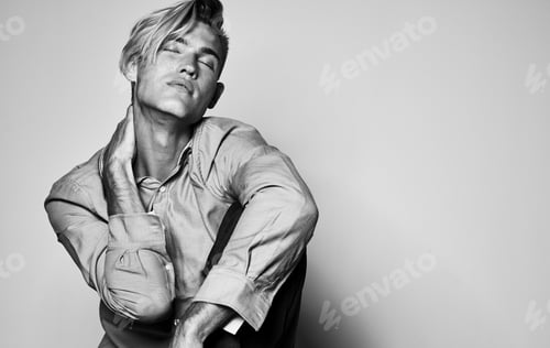 Preview: Gray photo sexy guy in a shirt gestures with his hands