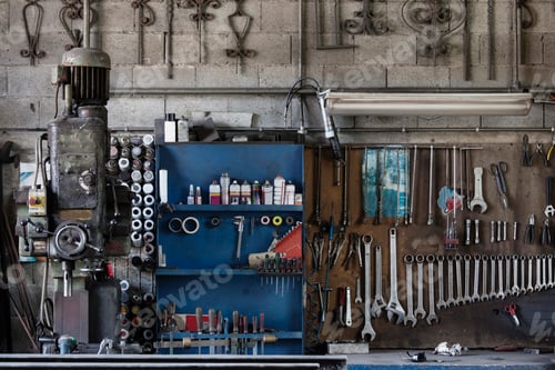 Preview: A wellorganized mechanic's workshop with an array of neatly arranged tools