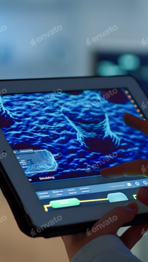 Preview: Close up of scientist analysing health informations in tablet