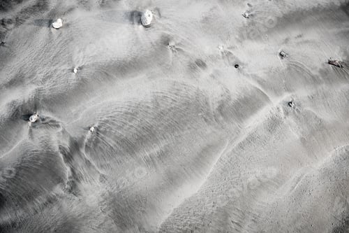 Preview: Close-up volcanic sand. Black and white overview
