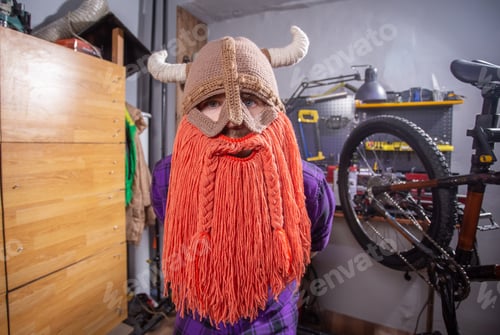 Preview: Halloween and carnival concept - a brutal viking in a mask
