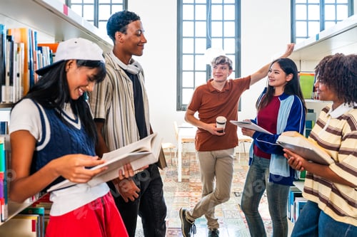 Preview: Diverse students collaborating learning in university library