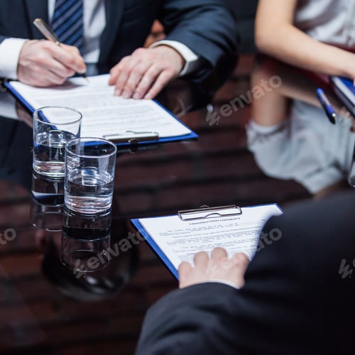 Preview: The businessmen giving signature to documents