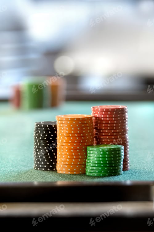 Preview: Vertical shot of the stacks of poker chips on a table