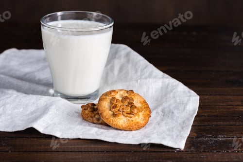 Preview: fresh milk in glass and homemade cookies wooden tabletop