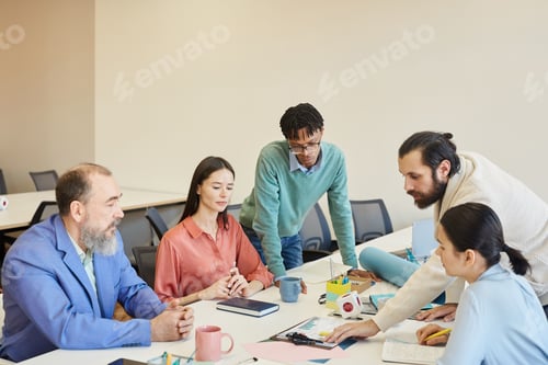 Preview: Five Business People Working Together