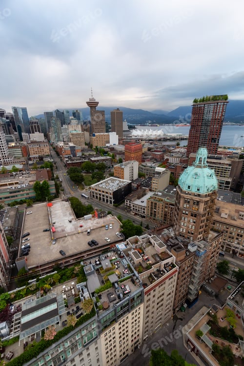 Preview: Aerial view of the modern city during a cloudy sunset. Downtown Vancouver