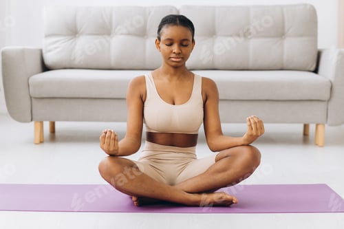 Preview: Young black woman meditating at home, yoga online concept, free space
