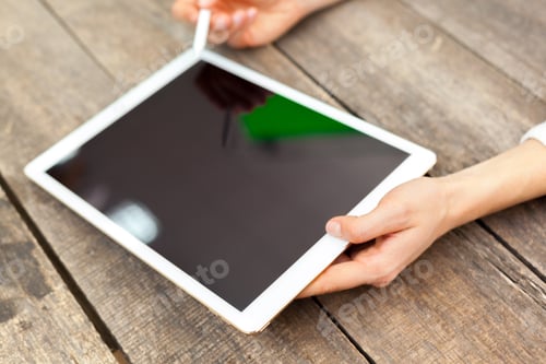 Preview: Woman Using Digital Tablet