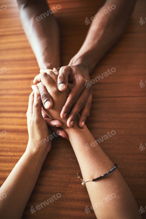 Preview: Im right here for you. High angle shot of two unrecognizable people holding hands.