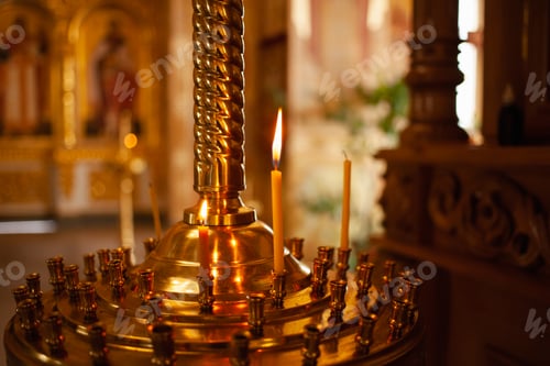 Preview: Candlestick. Candles in the church, church candle stand. Candles are burning
