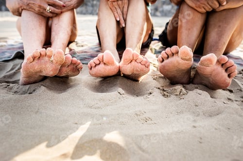 Preview: Senior friends enjoying the beach in the summertime