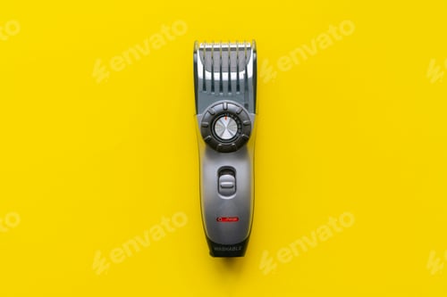 Preview: simple single abstract hair clipper isolated on the color background, barbershop accessory
