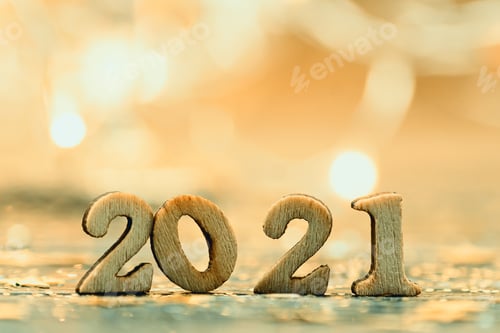 Preview: 2021 festive greeting card. Wooden numbers on gold bokeh background