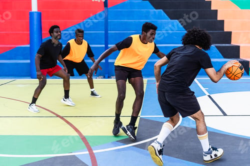 Preview: Young African friends playing basketball outdoor - Urban sport lifestyle concept