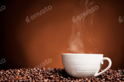 Preview: Coffee cup on coffee beans