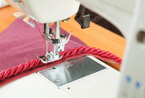 Preview: sewing machine needle and decorative edging cord. seiwng process.