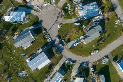 Preview: Hurricane strong wind destroyed suburban house roofs in Florida