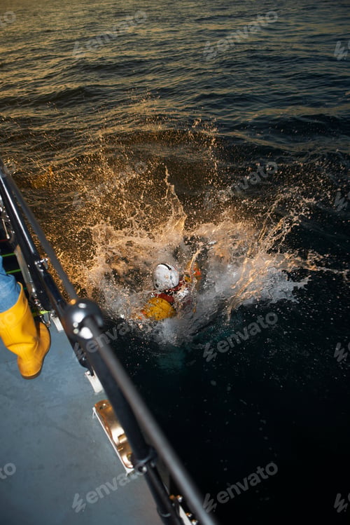 Preview: Lifeboat crew training with team member in sea