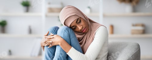Preview: Melancholy Concept. Depressed Black Muslim Woman In Hijab Feeling Upset At Home