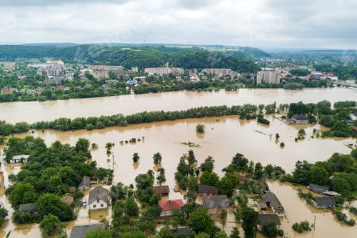 Preview: Aerial view of flooded houses with dirty water of Dnister river in Halych town, western Ukraine.