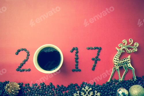 Preview: 2017 Coffee Bean Text And Christmas Decoration On Red Craft Paper For New Year Concept Background