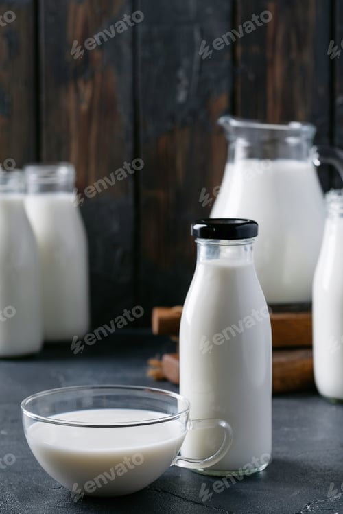 Preview: Fresh milk in different glass bottles