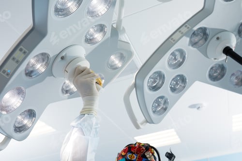 Preview: Surgeon Adjusting Lights in Operating Room