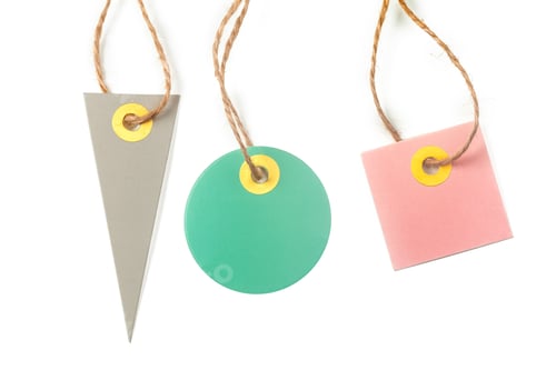 Preview: Colorful paper tags arranged on a white background for crafting and labeling purposes